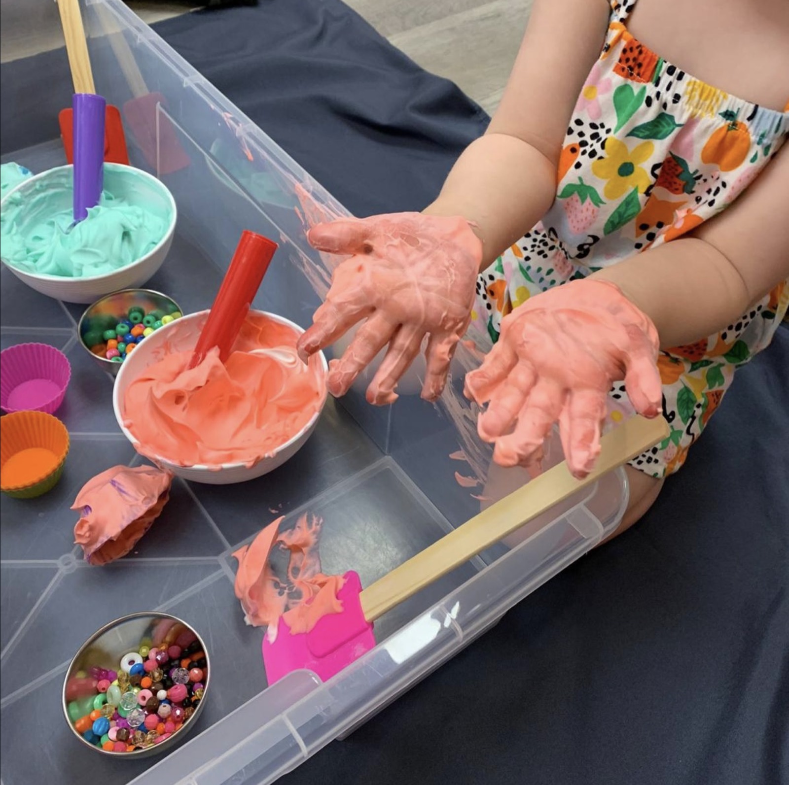 Hands-on process art and slime activities set up in the Mess Lab